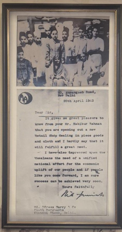 Framed photograph and letter dated 20 April 1943, as it hangs in the showroom